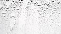 Water rain droplets on clear transparent glass background, clear water vapor bubbles on window glass Royalty Free Stock Photo