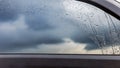 Water and rain drops on the glass car. Royalty Free Stock Photo