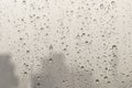 Water rain drops on window glass surface with cloudy background Royalty Free Stock Photo