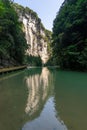 Water reflection of high towering cliff in Wulong krast national geology park, Chongqing, China Royalty Free Stock Photo