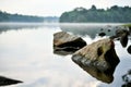 Calm water rocky rainforest Royalty Free Stock Photo