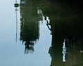 Water reflection of urban building construction on calm river surface Royalty Free Stock Photo