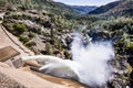 Water release at O`Shaughnessy Dam due to high levels of snow melt at Hetch Hetchy Reservoir in Yosemite National Park;  One of Royalty Free Stock Photo