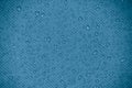 Water-repellent fabric in large raindrops. Blue rip-stop fabric. Tent textiles. Waterproof material