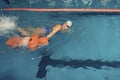 Water Rescue Training Trainer and Training Dummy in a Pool