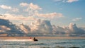 The water rescuer patrols sea shore on a jet ski