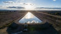 Water reserve for agriculture in dry areas. Aerial photo at sunset