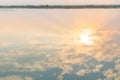 Water ripple circle on the surface of lake water with reflection of sky clouds Royalty Free Stock Photo