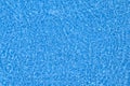 Water ripples texture on blue swimming pool background. Top view Royalty Free Stock Photo