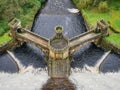 Water of the River Nidd spills over the 71m high stone dam of Scar House Reservoir in Nidderdale, Yorkshire, England, UK