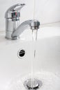 Water running down from the faucet Royalty Free Stock Photo