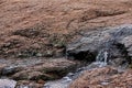 Water running over rocks and eroding over time Royalty Free Stock Photo