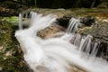 Water runs down a small stream, long exposure Royalty Free Stock Photo