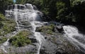 Waterfall, water rushes down rocks