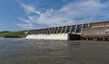 Water rushing out of open gates of a hydro electric power station Royalty Free Stock Photo