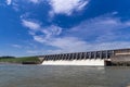 Water rushing out of open gates of a hydro electric power station Royalty Free Stock Photo