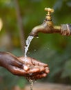 Water Scarsity Symbol - Drinking for African Children Royalty Free Stock Photo