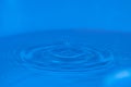 Water sculpture with a circular drop bounce on top Royalty Free Stock Photo
