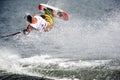 Water Ski In Action: Man Shortboard Tricks Royalty Free Stock Photo