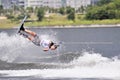 Water Ski In Action: Woman Shortboard Tricks Royalty Free Stock Photo