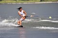 Water Ski In Action: Woman Shortboard Tricks Royalty Free Stock Photo