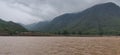 WATER SKY AND MOUNTAINS WITH GREEN