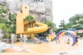 Water slide blur background in amusement theme park aquapark with blurry people and children having fun summer time relaxing Royalty Free Stock Photo