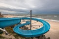 Water slide on an empty beach