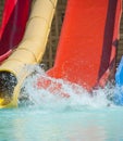 Water slides at a large swimming pool in luxury tropical hotel Royalty Free Stock Photo