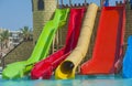 Water slides at a large swimming pool in luxury tropical hotel Royalty Free Stock Photo