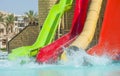 Water slides at a large swimming pool in luxury tropical hotel Royalty Free Stock Photo