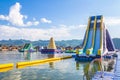 Water slides in tropical aqua park.Fun water park with mountain view Royalty Free Stock Photo