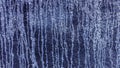 water sliding down a wall, forming a blue irregular linear pattern.  can be used as a background for all kinds of projects Royalty Free Stock Photo