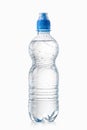 Water. Small plastic water bottle with water drops on white back Royalty Free Stock Photo