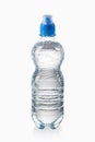 Water. Small plastic water bottle with water drops on white back Royalty Free Stock Photo