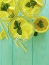 Water soda lemon tube citrus detox refreshment , freshness homemade health mint summer on a blue wooden background Royalty Free Stock Photo