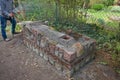 Water spanking on concrete during the construction of smoking in the garden