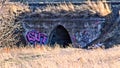 Water spill way with graffiti Royalty Free Stock Photo