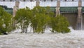 water spilling over open flood gates Royalty Free Stock Photo