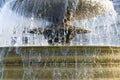 Water spills over the edge of a fountain in Trafalgar Square London Royalty Free Stock Photo