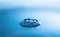 Water splash close-up. Crown of blue water. Water drop. Aqua background Royalty Free Stock Photo