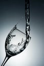 Water splash closeup in a transparent glass Royalty Free Stock Photo