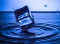 Water splash with cube and waves. Splash concept Royalty Free Stock Photo