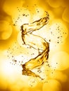 Water splash in the form of spiral gold color Royalty Free Stock Photo