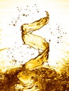 Water splash in the form of spiral gold color Royalty Free Stock Photo