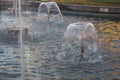 Water splash in garden fountain spreader Royalty Free Stock Photo