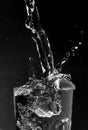 Water splash glass black Royalty Free Stock Photo