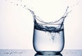 Water splash in a glass, capturing the essence of freshness and vitality Royalty Free Stock Photo
