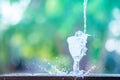 Water splash in glass Select focus blurred background Royalty Free Stock Photo