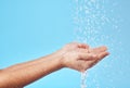 Water splash, hands and cleaning of a person busy with hand hygiene, skincare or hydration. Natural, clean flow and